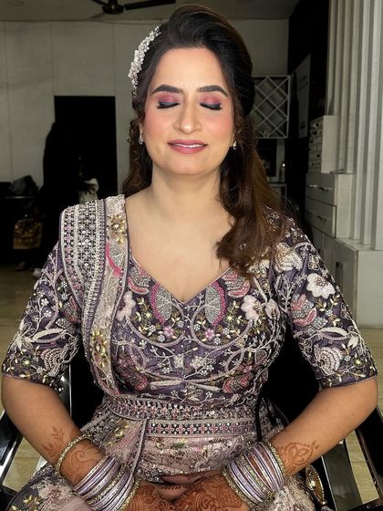 Glamour unleashed. For this look, I created a soft smokey eye with a pop of pink, paired with a flawless base and a natural lip color.