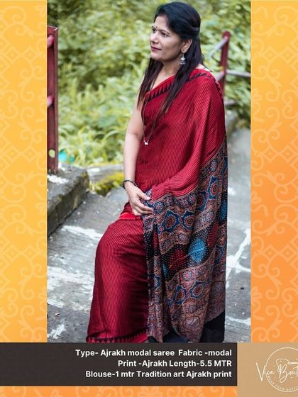 A beautiful shot of our red Ajrakh modal saree, showcasing its rich color and detailed pallu. This saree is perfect for those who appreciate the art of handblock printing.