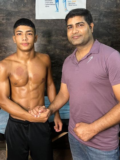 A handshake with wrestler Love to mark a successful session.