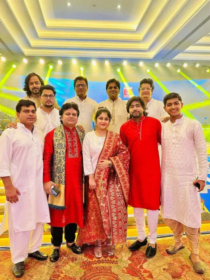 A group photo with the entire ensemble after a show for ONGC. I can assemble a large team of talented artists for a grand musical performance.