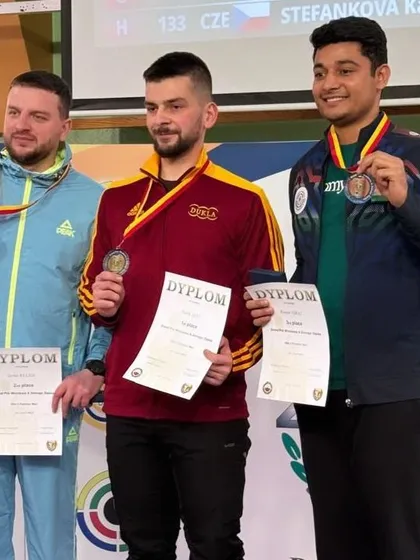 The ultimate goal: seeing our shooters on the international podium. Here, our academy athlete Niraj Kumar celebrates a medal win in Poland, a testament to the world-class mentorship and training we provide.