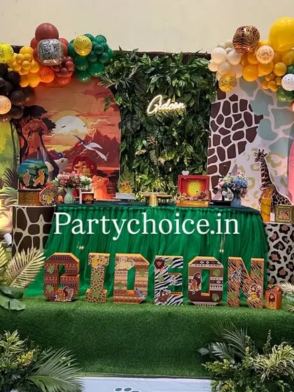 Our jungle and safari themed birthday parties are a huge hit with kids. We design a complete experience with character cutouts like Simba and Dumbo, themed cake stands, personalized photo displays, and dense balloon arches in jungle colors.