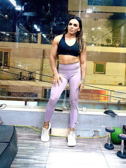 A relaxed pose showing my physique. Fitness is a lifestyle that gives you confidence both in and out of the gym.