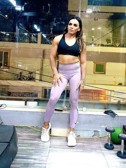 A simple, confident stance. My nutrition coaching is about building long-term wellness and a strong foundation, not just temporary results.