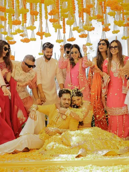 This is what a Haldi in Goa looks like. It starts cute and coordinated, and ends in a beautiful, joyful mess of flowers, laughter, and dhol madness. 10/10 would plan again.