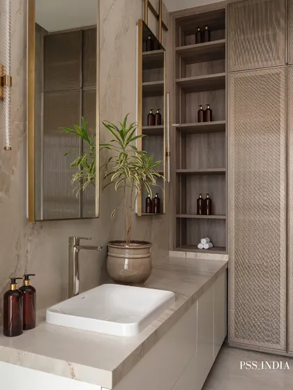 Even functional spaces like bathrooms can be serene sanctuaries. Here, I balanced minimalism with character, using earthy textures, clean lines, and a touch of greenery to create a spa-like retreat.