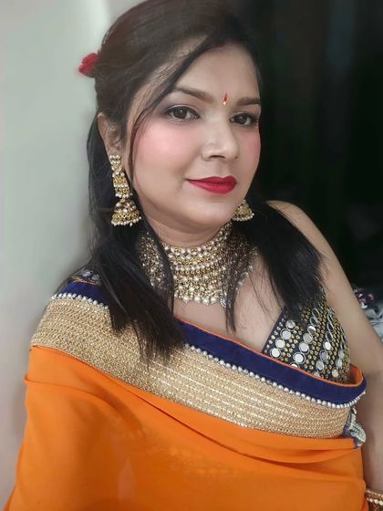 Another beautiful Karwa Chauth makeup look. A bold red lip and defined eyes are a timeless choice for this special festival.