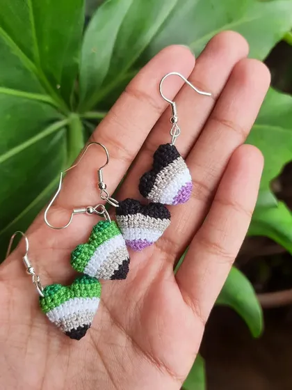 Matching sets of pride heart earrings. Here are the aromantic and asexual flag earrings, perfect for wearing your pride.