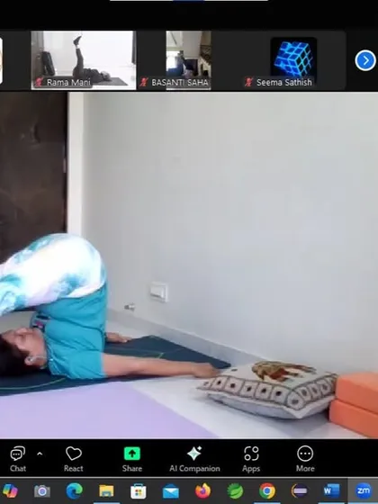 In our online Thyroid Yoga Workshop, an instructor demonstrates Halasana (Plow Pose). This inversion is known to stimulate the thyroid gland and improve circulation in the neck region, which is beneficial for managing both hyperthyroidism and hypothyroidism.