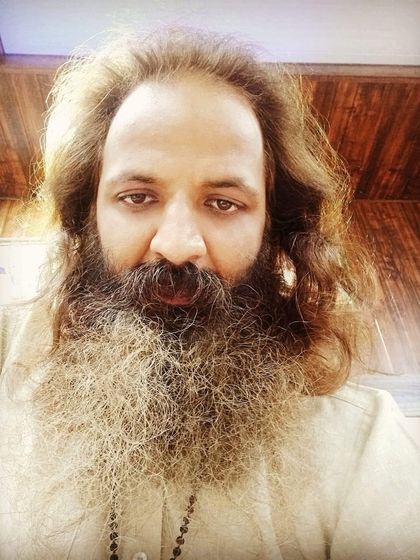 A throwback photo from when I had longer hair. The caption is a simple but profound reminder: "It is better to try to know yourself than to know others."