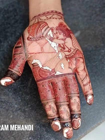 A special portrait design of Lord Krishna for a Janmashtami celebration. I can create detailed figures and scenes to make your festive mehndi truly unique.