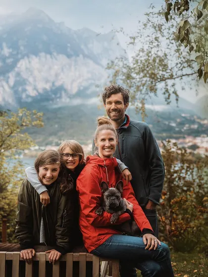 Your family's story is beautiful, and I'll travel to capture it against any backdrop. This stunning family portrait, with their sweet French bulldog, was taken against a breathtaking mountain view, proving that love makes any landscape feel like home.