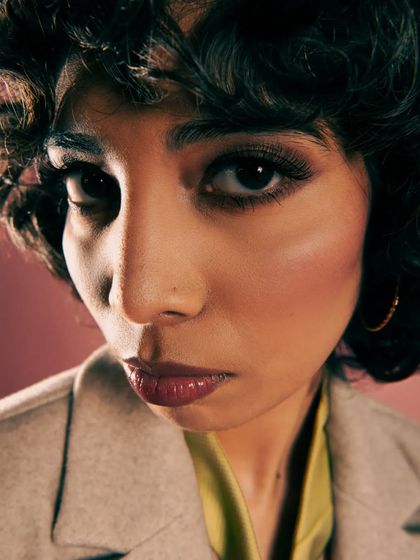 A slight variation of the previous shot, the fisheye effect continues to create a bold, graphic look. This style is perfect for contemporary fashion editorials that aim to break conventions and create a strong visual impact.