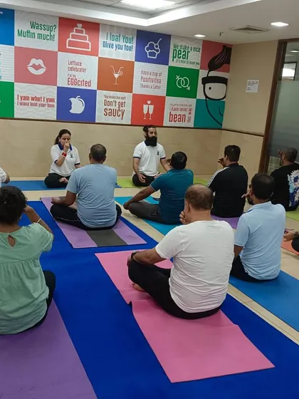 An indoor corporate yoga session held as part of our International Yoga Day events in Delhi. We are passionate about bringing the benefits of yoga and meditation to the workplace.