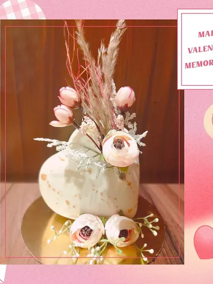 Our signature heart-shaped Piñata Cake for Valentine's Day. It has a hard chocolate shell that you can break to reveal a surprise inside, making it a fun and memorable gift.