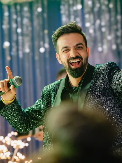 A candid shot of me laughing on stage. Genuine moments of happiness are what make an event truly special.
