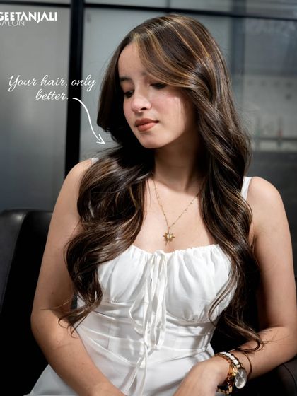 Your hair, only better. This look is all about enhancing the client's natural hair with a beautiful color and style for a flawless finish.