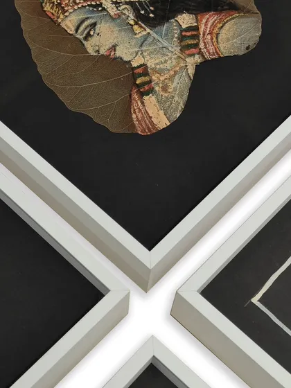 A creative shot showing the corners of four similar leaf paintings. This highlights how unique objects can be framed as a cohesive series to create a larger gallery wall display.