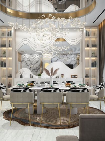 A render of a grand dining space, featuring a tree-slice-inspired rug and a massive, flowing chandelier. The back wall includes built-in shelving and a wavy, textured mirror.