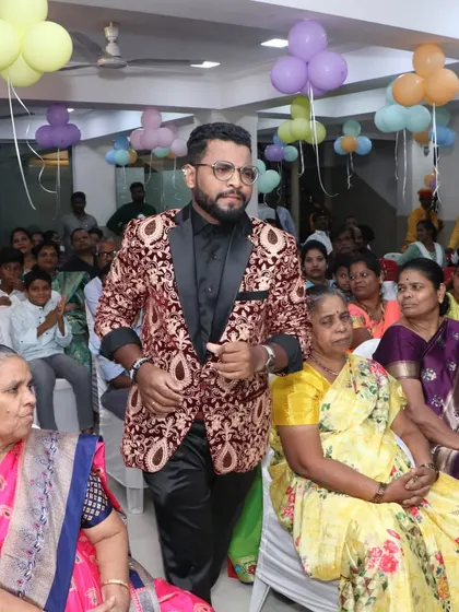Making my entrance through the audience at a family function. I love to engage with guests from the moment I arrive, creating a fun and inclusive atmosphere.