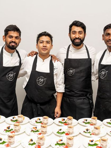 The Amiel Gourmet team, ready to serve at a special event. We are dedicated to providing a seamless and delicious experience for you and your guests.