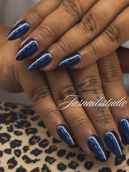 Another angle of the stunning blue chrome nails, showing how they look under different lighting. The shine is just incredible.