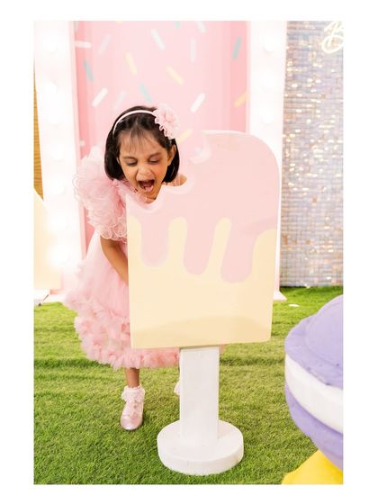 Another shot of the birthday girl having fun with our oversized ice cream prop.
