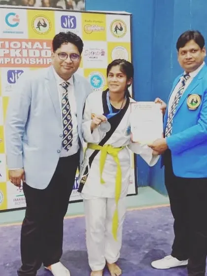 My student Insha Siddiqui receiving her silver medal at the National Hapkido Championship.