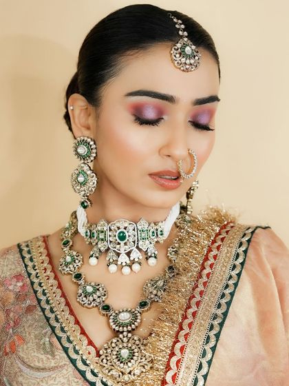 The closed-eye view showcases the purple and pink eyeshadow blend, a popular choice for modern brides. You will learn to create custom color stories for your clients.