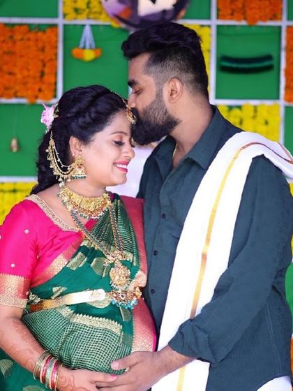 A tender moment between the happy couple. Asha's antique gold choker and haram are the perfect accessories for this joyous occasion.