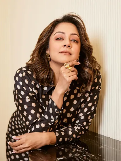This shot captures the effortless charm and style of Jyotika in this classic printed dress.