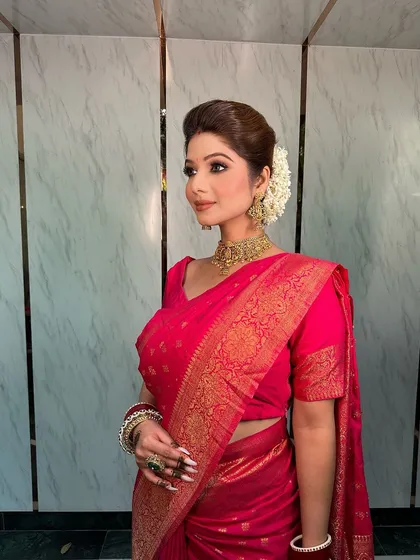 A timeless Karwa Chauth look featuring our beautiful temple jewellery choker. The intricate design adds a touch of grace and love to the celebration.