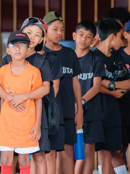 This is the face of determination. Our Bhoomi Program brings together talented kids from diverse backgrounds, united by their passion for tennis. We are proud to provide them with a safe, supportive, and high-performance environment to grow.