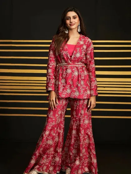 Get party ready with this fuchsia co-ord set. The flared pants are so comfortable for dancing all night long.
