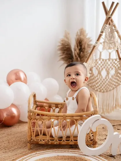 A big yawn from the birthday boy! I capture all the moments, from the high-energy smiles to the sleepy, cute expressions in between.