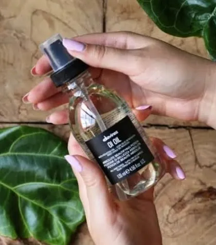 Davines OI Oil is a multi-benefit product that adds shine, softness, and detangles hair while fighting frizz. A true hero product for all hair types.