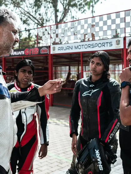 Our coaching goes beyond just track time. Here, one of our expert instructors provides detailed feedback to participants of the Petronas TVS Racing women’s selection rounds, focusing on technique and strategy.