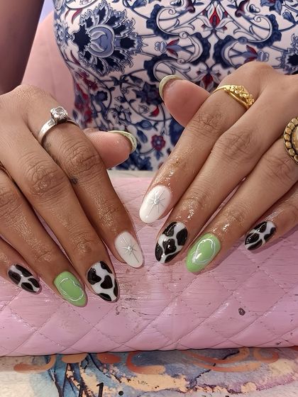 The mood for the week: playful, fresh, and a little wild. I love how this mismatched set with cow print, minty green, and starburst accents turned out.
