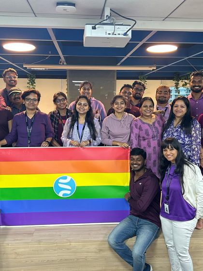 Another photo of our team celebrating Pride. We are proud to create a safe and welcoming environment where every individual is valued.