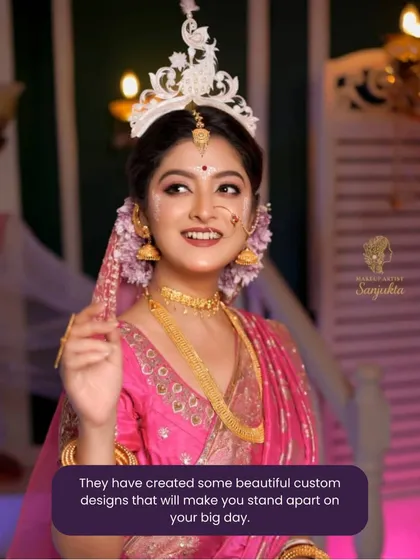 A happy bride showcasing her custom mukut. We believe these beautiful designs help you stand apart and shine on your big day.