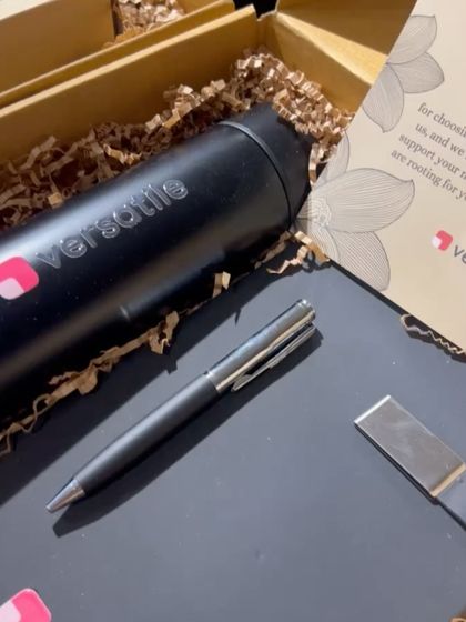 A close-up of the custom branding for Versatile. We can add your company logo to a wide range of products, including flasks, notebooks, and pens, for a truly bespoke corporate gift.