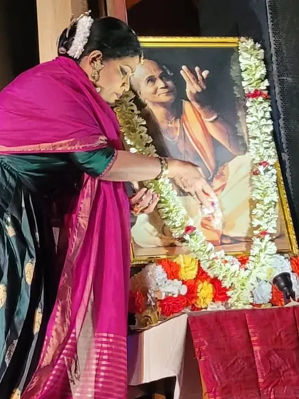 Placing flowers at the portrait of Kelu babu. His legacy continues to inspire generations of dancers across all styles.