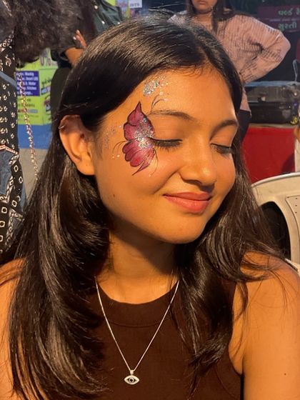 Whimsical Face & Body Art photo 15