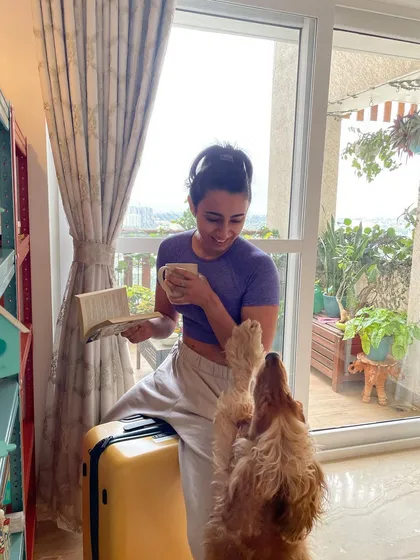 A sweet moment shared with my dog while I take a coffee break.