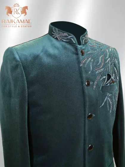 Another angle of the green velvet Jodhpuri, showing the sheen of the fabric and the intricate embroidery.