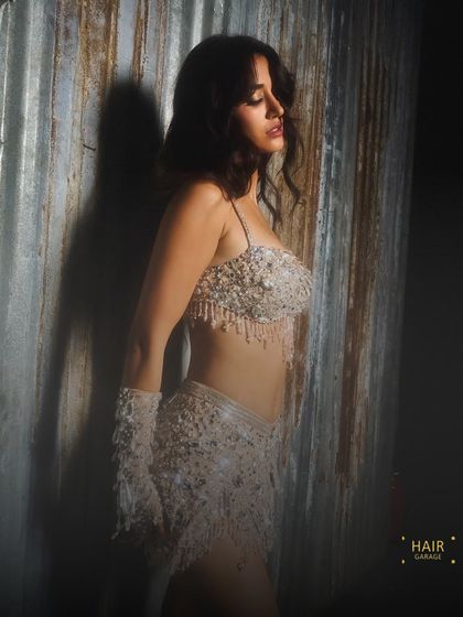 A side profile from the IPL shoot. This angle shows off the beautiful, shimmering makeup and the soft texture of her hair.