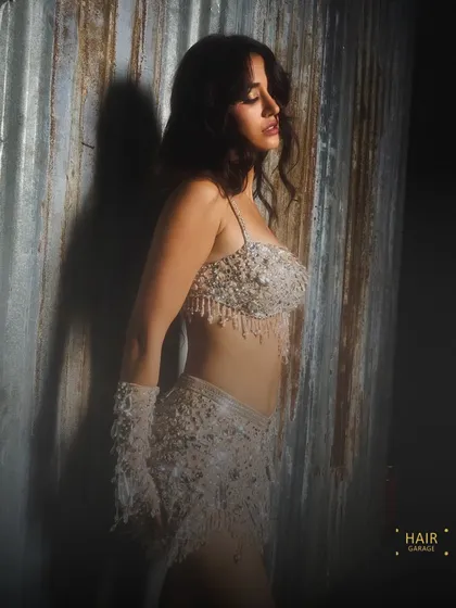 A radiant makeup look for Disha Patani's IPL performance. The look had to be glamorous and camera-ready, with a focus on glowing skin and defined eyes that would pop on stage.
