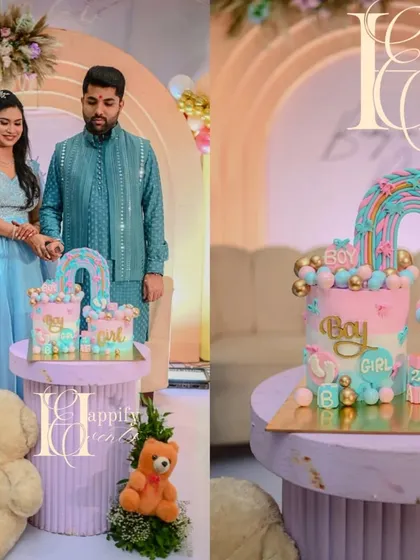A closer look at the gender reveal cake cutting moment. The cake, with its "Boy or Girl" theme and rainbow design, is placed on a stylish fluted pedestal that complements the modern pastel decor of the baby shower.