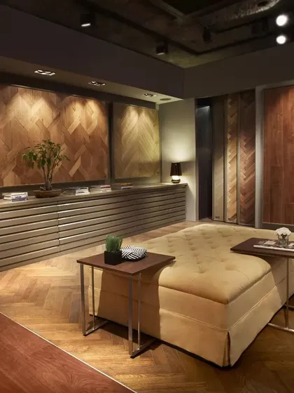 A comfortable seating area within the FCML wood floor showroom. The design allows clients to relax and discuss options while surrounded by beautiful examples of wood flooring applied in various patterns.