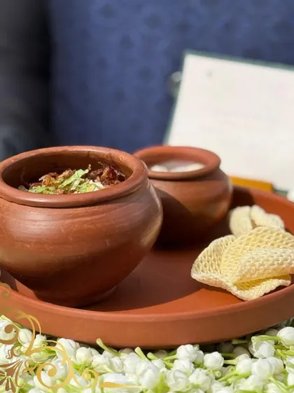 My dum biryani is slow-cooked and served in traditional terracotta pots. This method not only looks beautiful but also seals in the authentic, soulful flavors of the dish.